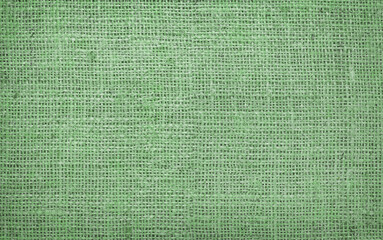 Green canvas texture with real linen threads on canvas with beautiful linen texture on canvas as sample of green linen canvas