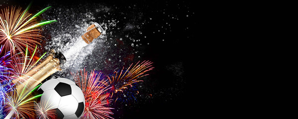 Soccer ball with fireworks and an exploding bottle of champagne on a black background. Ideal for...
