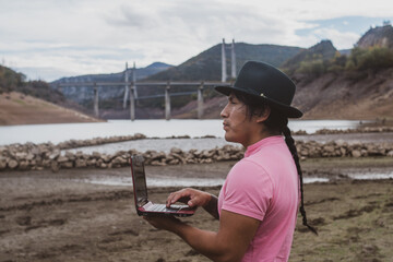 Ecuadorian engineer of Otavaleña culture working in Europe