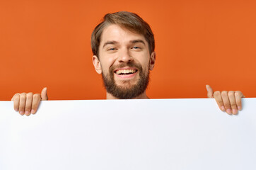 funny man holding a mockup poster discount isolated background