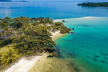 Beautiful tropical island koh Kham, white sand beach with volcanic rocks, near koh Mak, Trat, Thailand