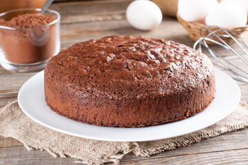 Chocolate sponge cake on a wooden table