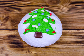 Fototapeta na wymiar Christmas gingerbread cookie on the wooden table