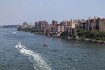 Roosevelt Island Skyline along the East River with Boats in New York City