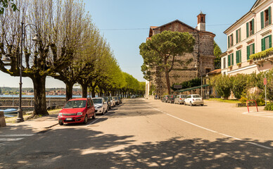 Obraz premium Lakeside road of Angera on the shore of Lake Maggiore, Italy