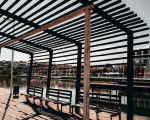 City view from shaped lines of benches
