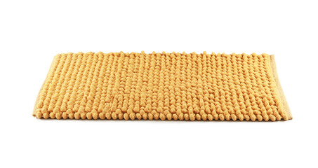 New yellow bath mat isolated on white