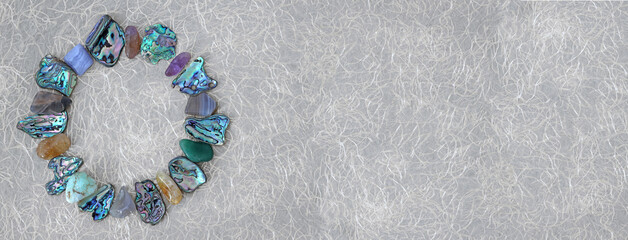 Circle of abalone and tumbled healing stones message banner - beautiful semi-precious polished...