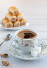 A cup of Turkish coffee and traditional sweetness - baklava.