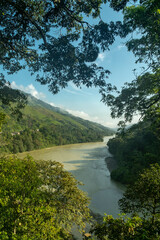 Natural landscape overlooking the Cauca river in Puerto Valdivia, Antioquia, Colombia.