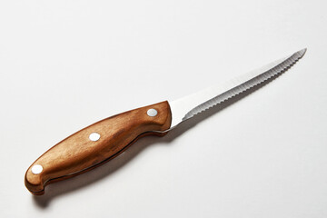 Meat steak knife on white background with copy space