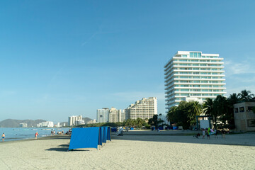 Santa Marta, Magdalena, Colombia. December 23, 2019: Buildings and blue sky on the beautiful horizon beach.