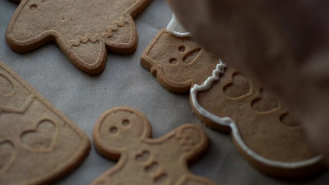 Christmas gingerbread cookies cooking for holiday. Homemade Christmas baking and cookies decoration.