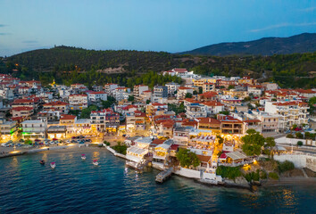 Obraz premium Neos Marmaras city, Greece. Aerial evening view of village, Sithonia peninsula of Halkidiki