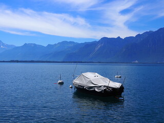 Hidden luxury motorboat on Lake Geneva at Montreux city, Switzerland