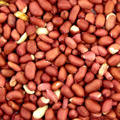 Peeled raw peanuts food background