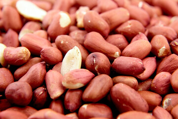 Obraz premium Peeled raw peanuts food background