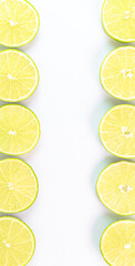 Lemon slices bordering white background vertical