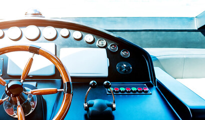 Steering wheel on luxury yacht © xy