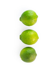 Three ripe green limes in a row on a white background