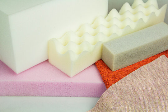 a piece of foam rubber of different sizes and colors, production of upholstered furniture.