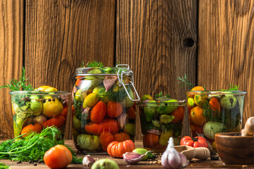 Fototapeta na wymiar Fresh Vegetable Preserves in Jar. Pickled Tomato