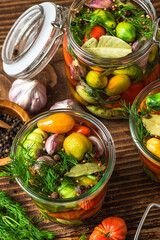 Pickled Tomatoes in Jar with Herbs and Garlic