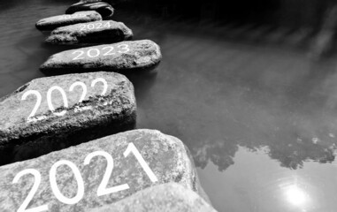 Number  2021 to 2028 on stepping stones - obrazy, fototapety, plakaty