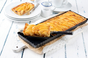 Traditional French quince tart served as close-up in classic backing dish
