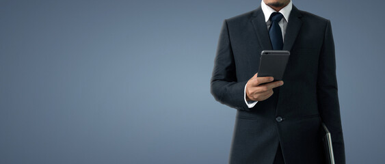 Man holding smartphone device touching screen