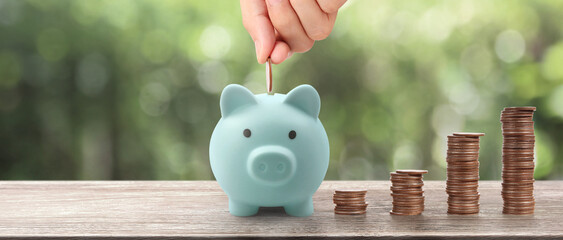 Stack of coin with trading graph, financial investment concept. and Piggy bank