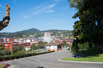 Aerial view of La Felguera, industrial city in Langreo. Old industrial colorful tower is nowadays...