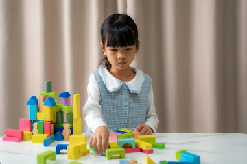 Children playing with toy building blocks at home,Educational toys for child.