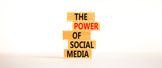 Power of social media symbol. Wooden blocks with words The power of social media. Beautiful white background, copy space. Business, power of social media concept.