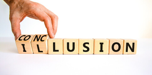 Conclusion or illusion symbol. Businessman turns wooden cubes and changes the word 'illusion' to...