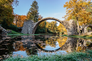 Unique looking bridge Rakotzbrucke,also called Devils Bridge,Saxony,Germany.Built to create circle...