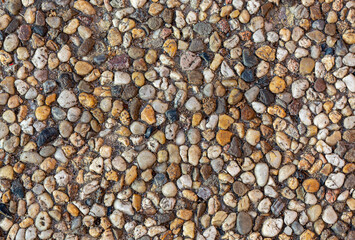 small brown pebbles background texture close up