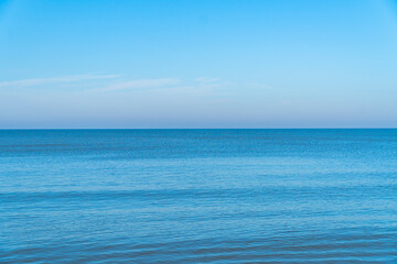 calm blue sea on an autumn sunny day close up