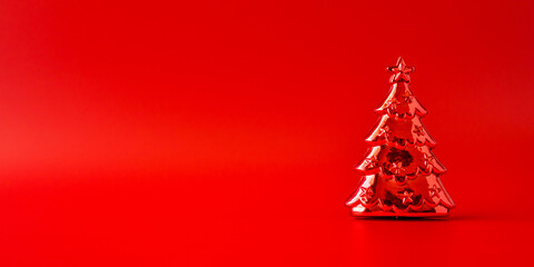 Christmas tree on red background new year  holiday celebration concept