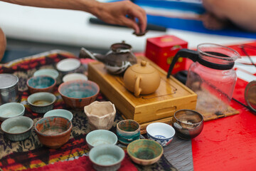 Obraz na płótnie Canvas chinese tea ceremony and lots of tea utensils