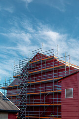 Fototapeta premium red building under construction