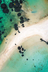 Beautiful tropical island koh Kham, white sand beach with volcanic rocks, near koh Mak, Trat, Thailand