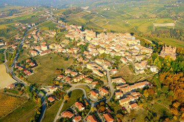 Aerial view of the village of Novello, in the hilly region of Langhe (Piedmont, Northern Italy), fall season; UNESCO Site since 2014. - obrazy, fototapety, plakaty