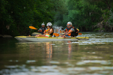 Friends are canoeing together