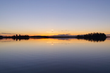 Fototapeta na wymiar Colourful Sunset at Astotin Lake