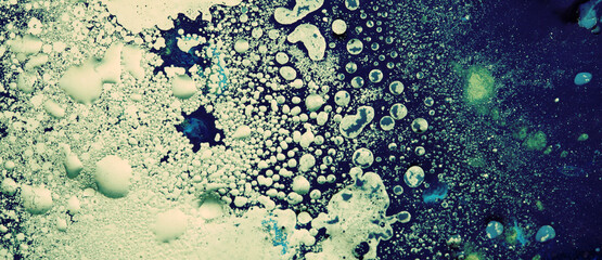 Blue color Abstract bubble drop texture background. Acrylic color in water and oil. Horizontal long...