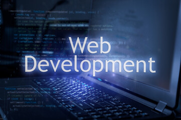 Web development inscription against laptop and code background. Learn web development programming language, computer courses, training.