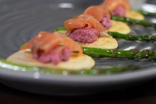 Smocked salmon with bilini 