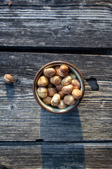 peeled hazelnuts in a small bowl