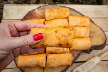 homemade thin tomato pancakes with meat filling